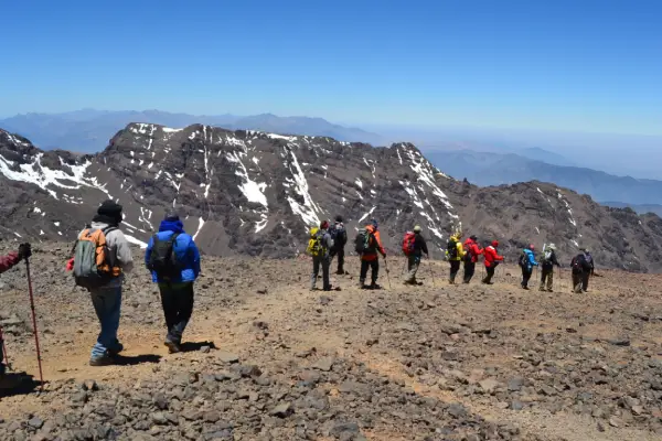 Hiking down from Toubkal summit back toward Imlil valley